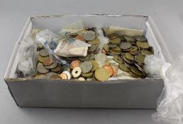 Box Containing Foreign Coins and a Few Notes, Mostly Sorted by Country.