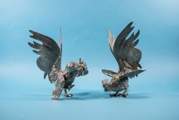 A Vintage Pair of White Metal 'Fighting Cocks' Figures in realistic form. 8.5 inches high.