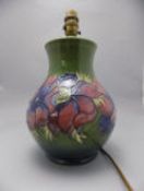 Moorcroft Large Tube Lined Lamp Base ' Clematis ' Design on Green Ground. Stands 12.5 Inches High.