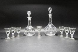 A 19th Century English Set of Seven Liqueur Drinking Glasses + Two Cut Glass Decanters From The