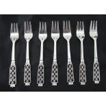 Swedish Set of Eight Good Quality Silver Fruit Forks with pierced work fancy handles.