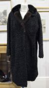 Black Astrakhan Three-quarter Length Coat with dark brown mink collar with revers, slit pockets,