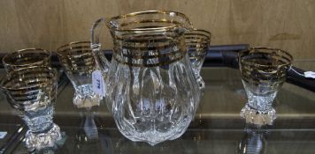 Glass Lemonade Set comprising jug and six glasses with gilt decoration.