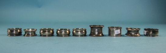 A Collection of Antique and Vintage Silver Napkin Holders (10) in total.