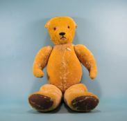 Vintage Well Loved Distressed Large Teddy Bear with jointed arms and legs, with a pointed nose.