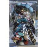 Bag of Costume Jewellery Bracelets, beaded, faux gem set and a bangle etc