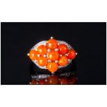 Orange Ethiopian Opal Cluster Ring, nine round cut cabochons of the unusual orange opal,