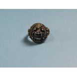 Early To Mid 20thC Maori Silver Ring, Stylised Figural Mask To Top With Rope Twist And Bead Work