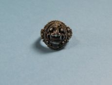 Early To Mid 20thC Maori Silver Ring, Stylised Figural Mask To Top With Rope Twist And Bead Work