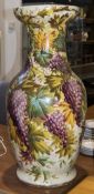 A Large Ceramic Grapes Decorated Floor Standing Vase. c.1920's. Standing 30 Inches High.