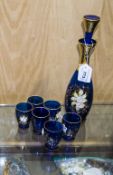 Murano Glass Decanter Set comprising decanter and six tot glasses. With embossed floral decoration