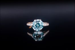 18ct Yellow Gold Set Single Stone Zircon/Diamond Ring The faceted natural zircon of excellent colour