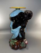 Majolica Blackamoor Jardiniere Stand, a semi-nude blackamoor, his skin finished with a lustre glaze,