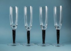 A Matching Set of 4 Champagne Glass Flutes with Black Stems on Round Bases. Each Stands 9.
