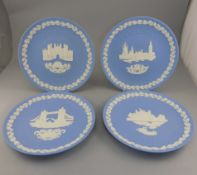 A Collection of Four Wedgwood Jasper Early Christmas Plates comprising 1974 1975 1976 1977.