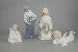 A Small Collection of Nao By Lladro and Lladro Style Figures. ( 4 ) In Total.