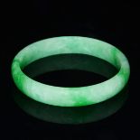 冰種翡翠綠玉鐲 Glass Jadeite Bracelet with Icy Green Patches in High Translucency. Diameter: 2⅞ in (7.2 cm)