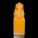 壽山石獅子鈕印料 Shoushan Stone Seal Surmounted by a Buddhist Lion Knob Height: 4⅜ in (11.1 cm) Weight: