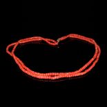 红珊瑚方柱珠雙串項鏈 A Two-Strand Coral Bead Necklace Diameter: 8⅜ in (21.3 cm) Weight: 65 g Starting Bid: $