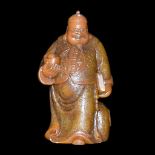 壽山石雕富豪立像 A Well Carved Shoushan Stone Figure of Man of Wealth Height: 7 in (17.8 cm) Weight: 1454