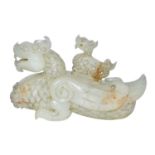 白玉雕龍頭鳥身带盖尊賞件 A Carved Jade Mythical Beast Zun with Dragon Head and Bird Wing-Tail and Cub as