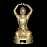 銅鎏金釋迦佛祖坐像 Gilt Bronze Figure of Buddha Seated in dhyanasana with arms raised.  Height: 7½ in (19.1