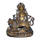 西藏銅鎏金護法金剛像 A Gilt Bronze Figure of Nagaraji, Tibet Sided sideways on a makara over a lotus base.