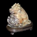 壽山石雕魚化龍戲浪賞件 Carved Shoushan Stone Ornament of Dragon-Fish Delivering Wealth  Height: 5¾ in (14.6 cm)