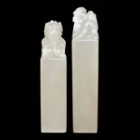 芙蓉石荔枝凍獅鈕印料兩件 Two Translucent Furong Stone Seals Carved with Lion Knob  Height: 5 in (12.7 cm), 5⅝ in