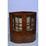 Walnut bow front china cabinet, two glaz