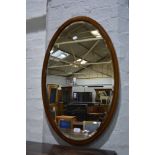 Edwardian oval mahogany wall mirror, bev