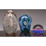 Hollowed out coloured glass paperweight,