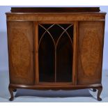 Walnut bow front display cabinet, plain