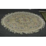 Chinese sculptured wool oval rug, floral