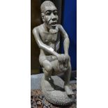 African figure, modelled as a tribesman,