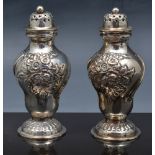 Pair of Victorian silver ogee shape cond