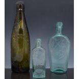 Old glass bottles, stoneware jars and bo