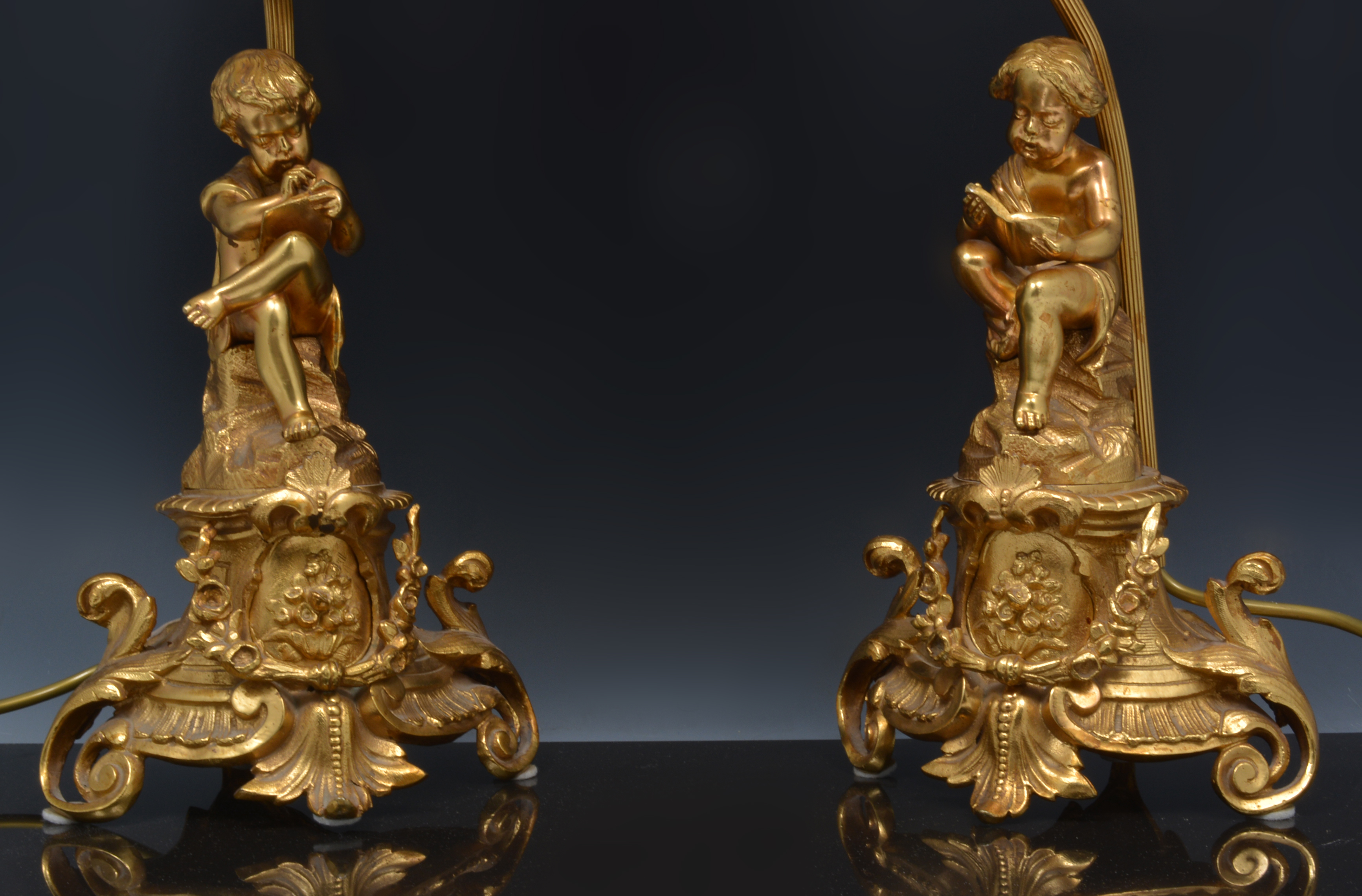 Pair of gilt metal lamp bases, modelled