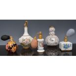 Collection of ceramic perfume bottles an