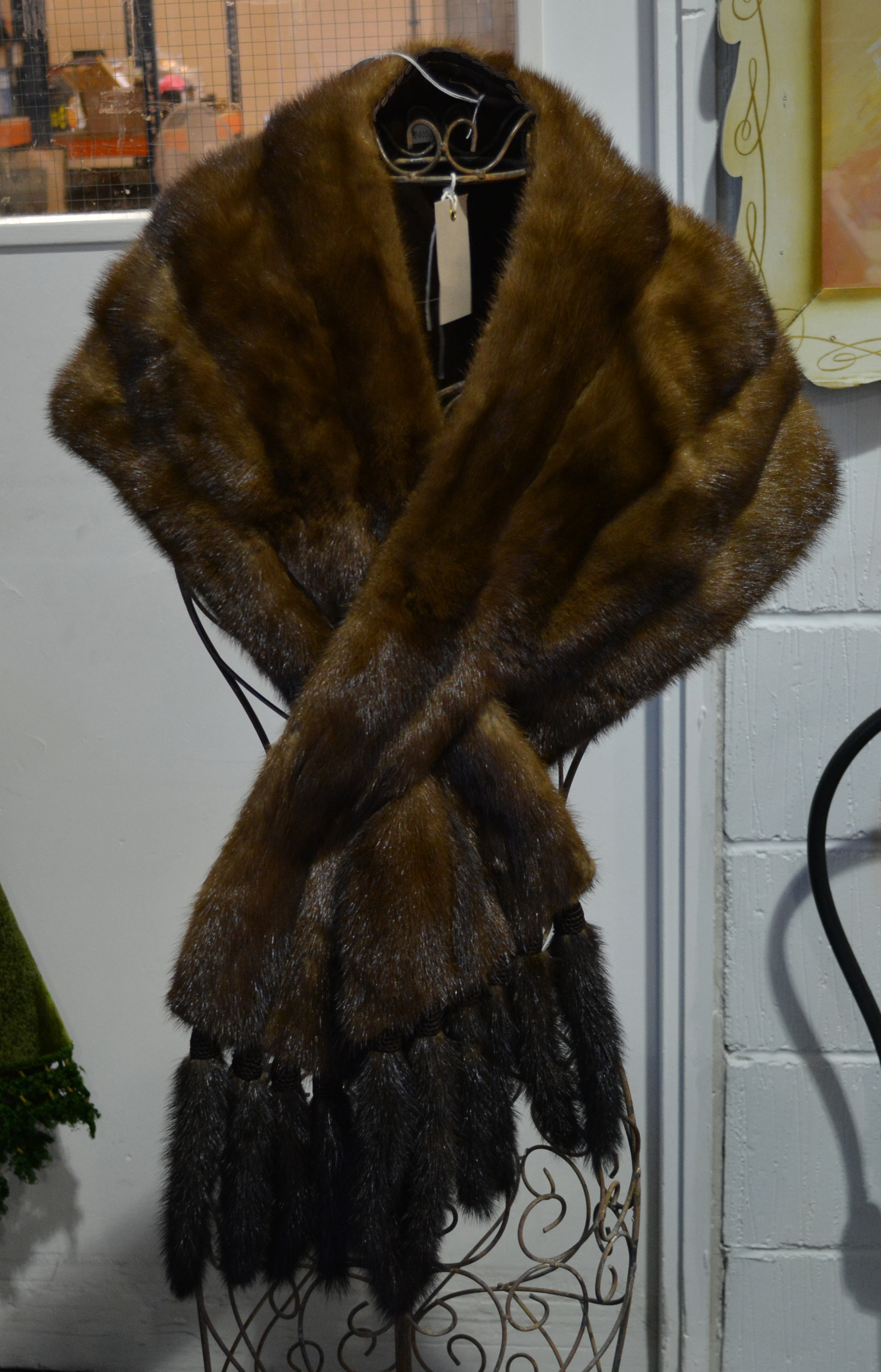 Mink fur stole with tassels, and a black