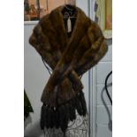 Mink fur stole with tassels, and a black