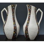 Two Poole pottery models of leaping Dolp