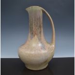 A French Art Pottery ewer, in the manner of Dalpayrat, early 20th Century, the neck with streaked