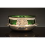 A Liberty 'Tudric' pewter bowl, designed by Archibald Knox, circa 1910, cast with twin-handles and