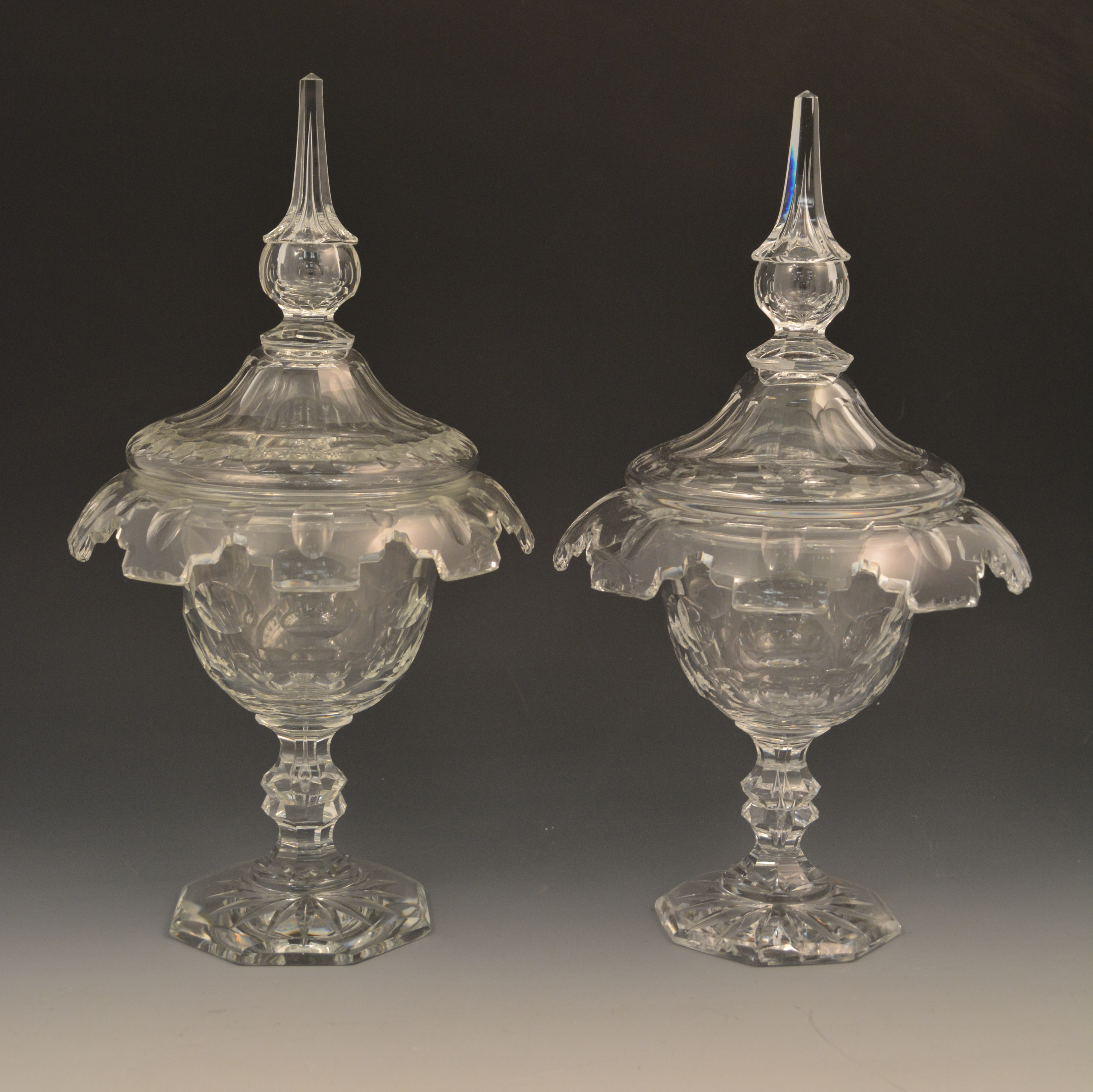 A pair of Regency style cut glass campan