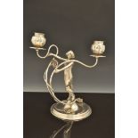 An American Art Nouveau style figural candelabrum, made by the Victor Silver Co., silver plated,