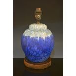 A Ruskin Pottery lamp base, of ginger jar form, with blue crystalline below a band of pale blue