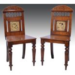 A pair of late Victorian mahogany hall c