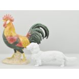 Beswick cockerel, stamped 1892, height 24cm a.f. and a Meissen model of a dog, stamped 78750 a.f.