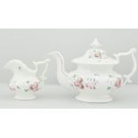 1820's tea pot, with floral design on a white background, height 18cm, accompanied by a sucrier, a